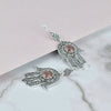 Artisan sterling silver Hamsa earrings handcrafted with Cherry Quartz gemstone