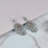 Artisan sterling silver Hamsa earrings handcrafted with Cherry Quartz gemstone