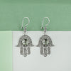 Handmade sterling silver filigree Hamsa earrings featuring Prasiolite stone