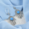 Handmade sterling silver filigree Hamsa earrings featuring Blue Turquoise stone