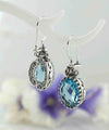 Filigree Art Blue Topaz Gemstone Heart Detailed Women Silver Oval Drop Earrings