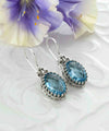 Filigree Art Blue Topaz Gemstone Heart Detailed Women Silver Oval Drop Earrings