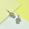Artisan handmade sterling silver Hamsa earrings with golden Citrine gemstone