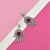 Handmade sterling silver filigree Hamsa earrings featuring red Ruby Corundum stone