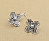 Oxidized vintage sterling silver daisy earrings with intricate lace filigree