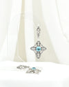 Oxidized sterling silver Blue Topaz cross earrings with intricate openwork filigree