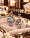 Oxidized sterling silver Blue Topaz clover cross earrings with intricate openwork filigree