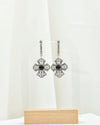 Natural Black Onyx three-petal cross dangle earrings in handmade sterling silver for women