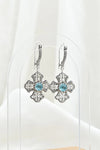 Natural Blue Topaz three-petal cross dangle earrings in handmade sterling silver for women